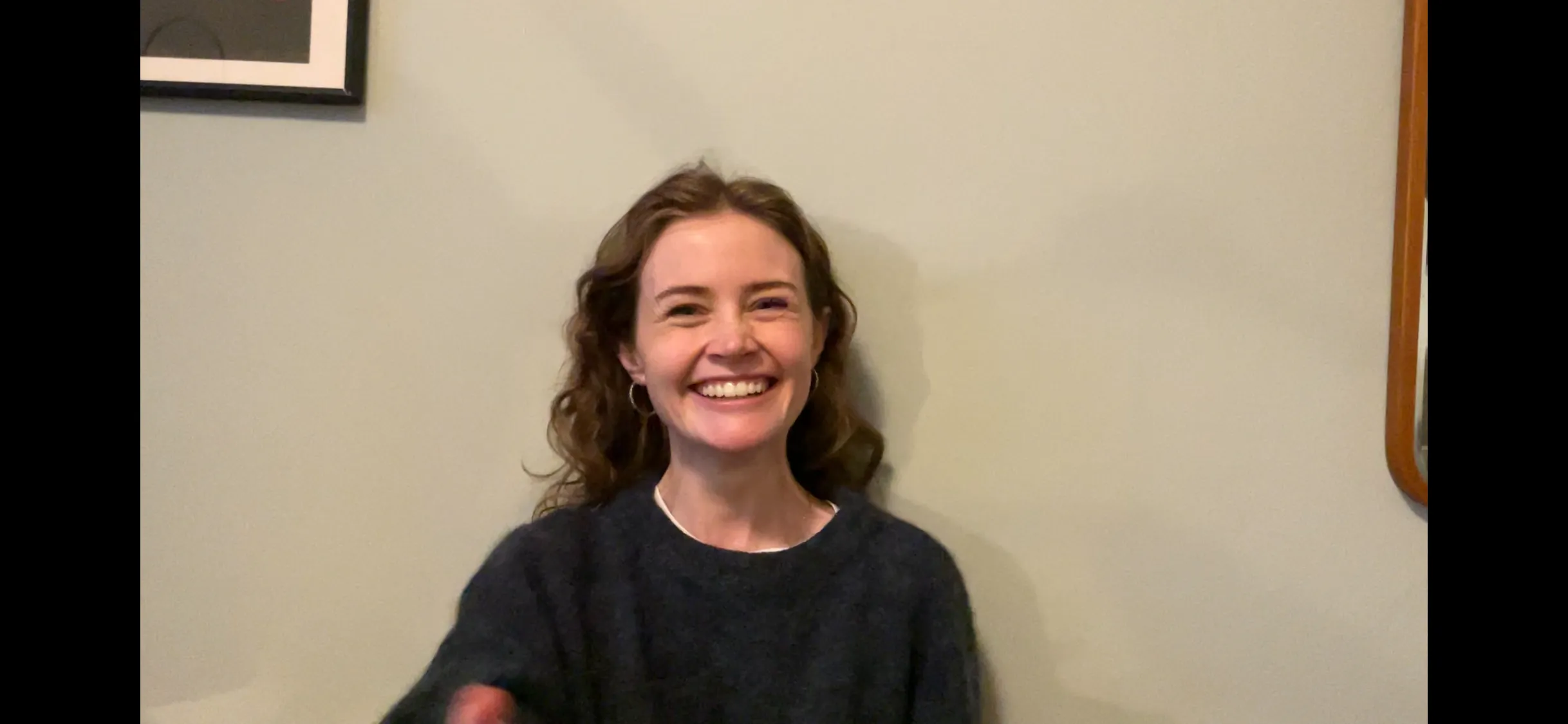 Portrait of Nora starting to laugh